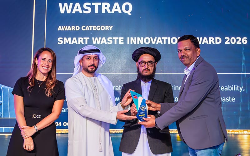 Mr. Dasharath K receiving the Smart Waste Innovation Award 2026 for WASTRAQ at the IBS Achiever Awards, Dubai